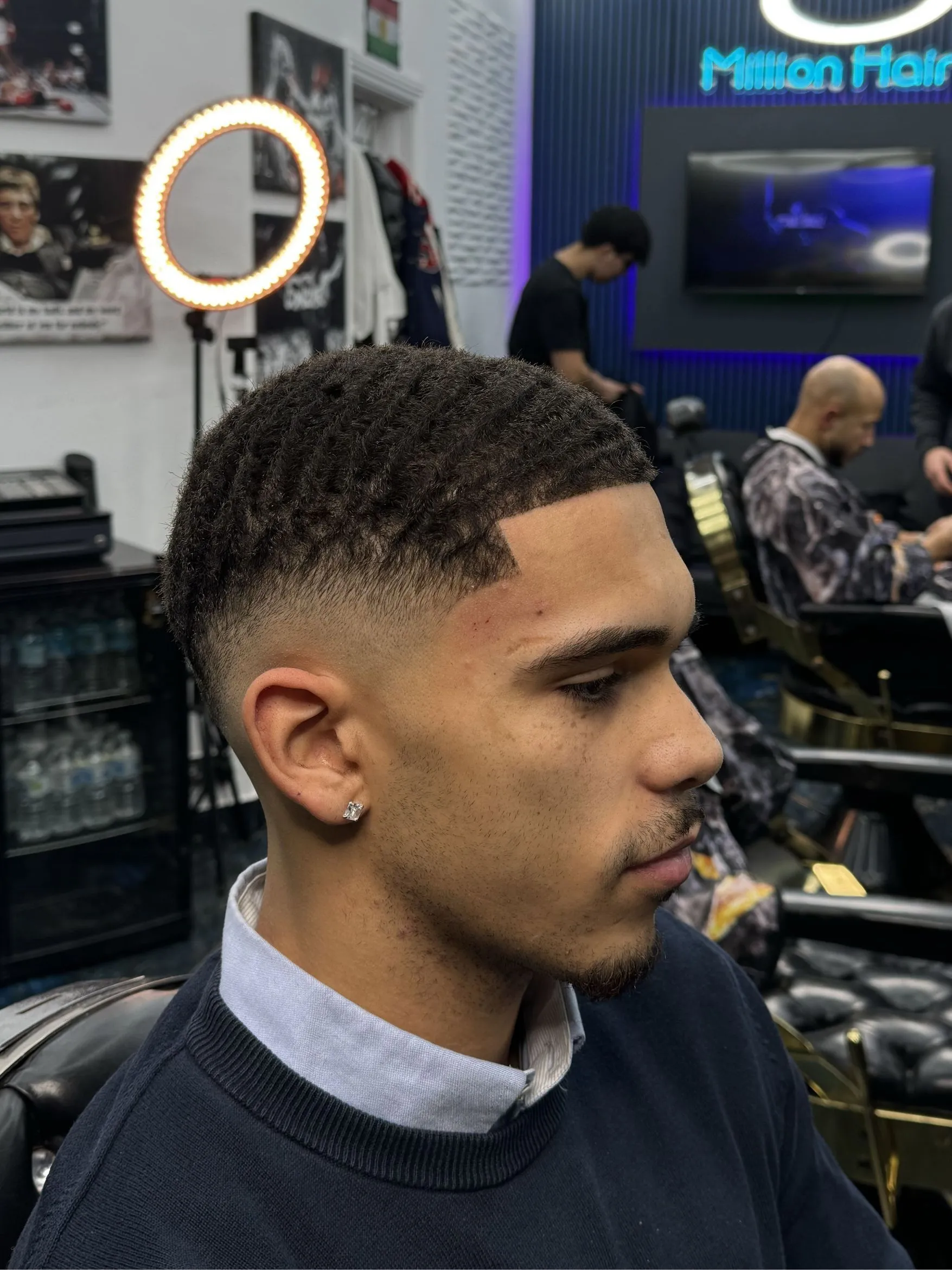 A skin fade and beard shape up finished at Millionhair