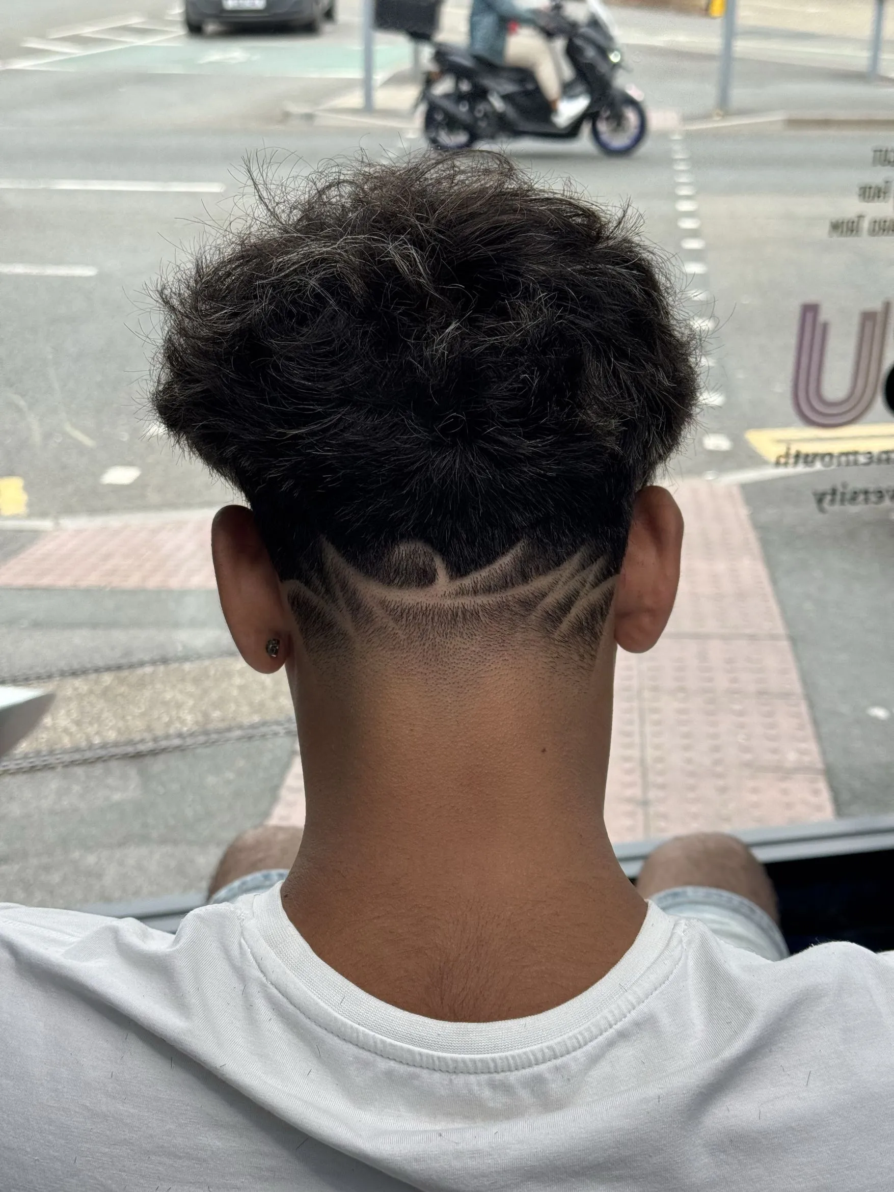 The back of a fresh fade outside the shop on Charminster Road