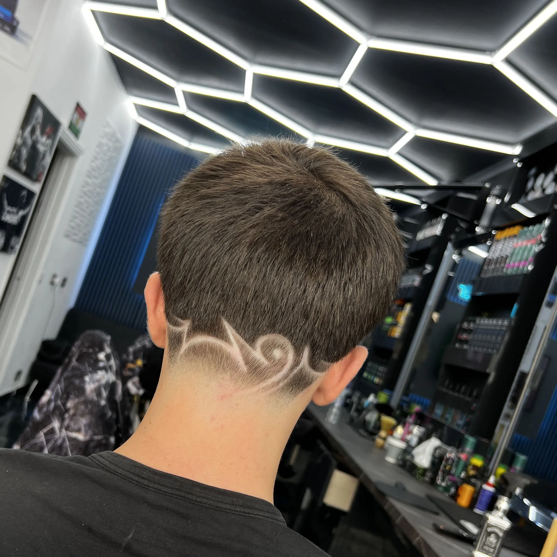 Inside Millionhair, the hexagon lights on and a cut in progress